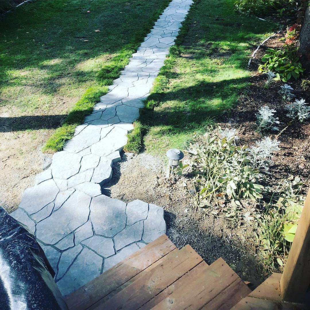 Natural stone steps and landing built by Great Canadian Landscape