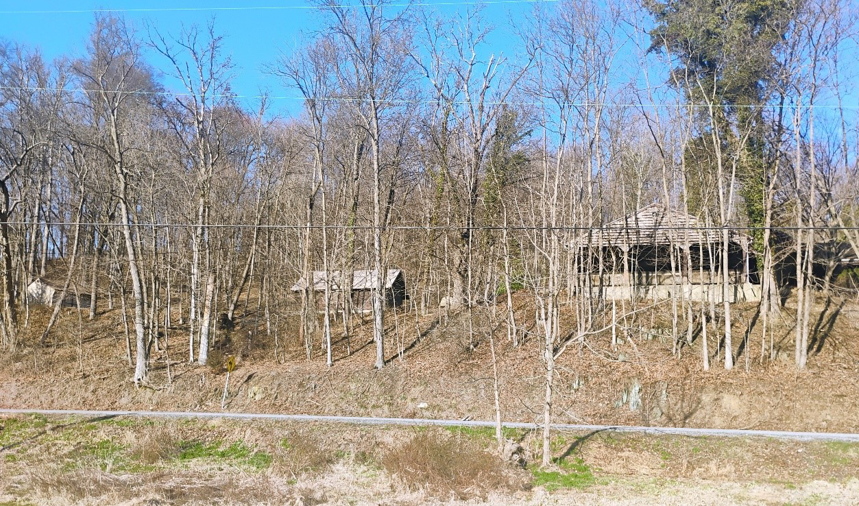 This is a view of the Glattfelder Homestead, with the current barn in the background to the right, from the York County Heritage Rail Trail.