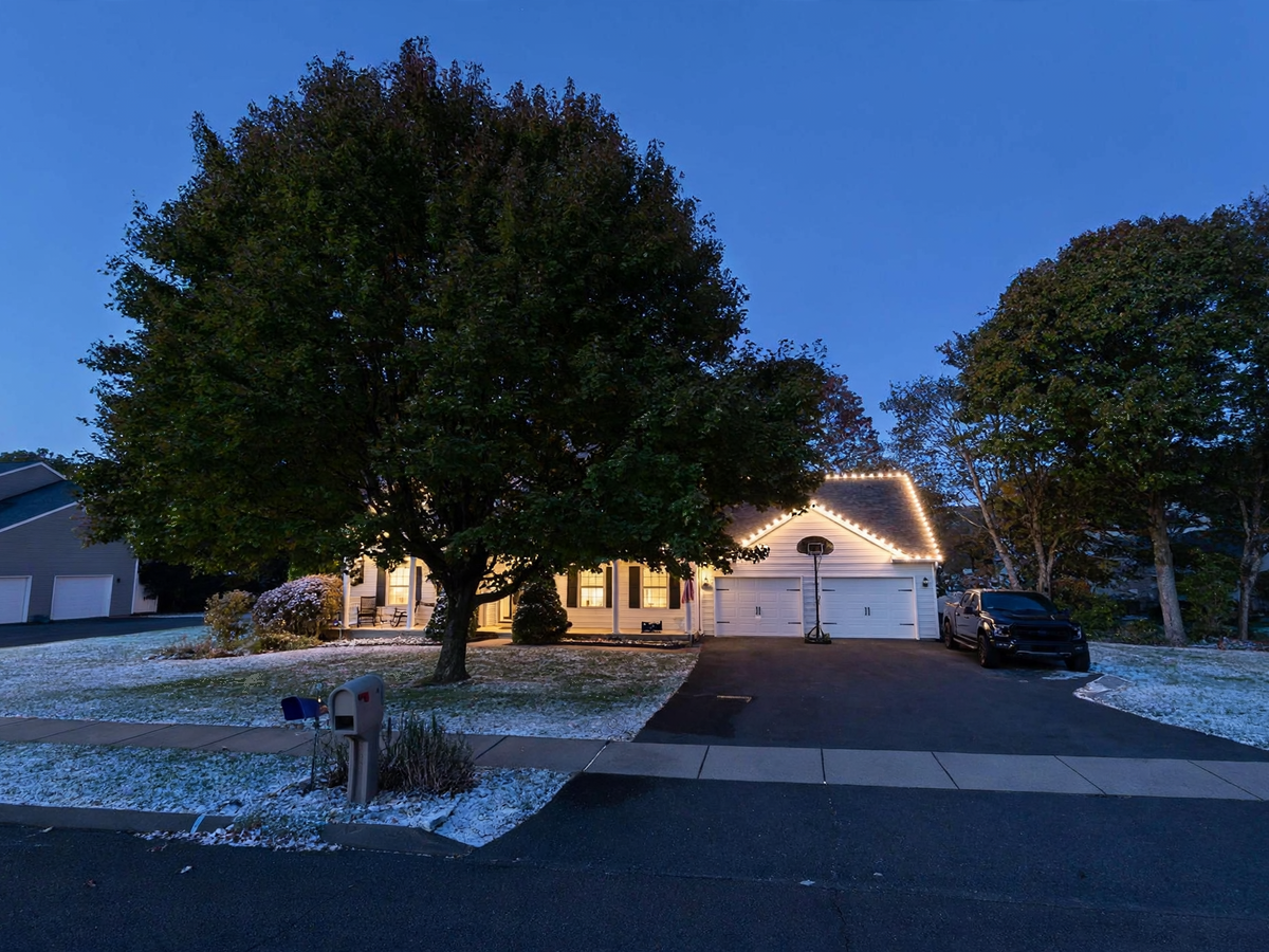 Professionally installed Christmas lighting on a suburban home