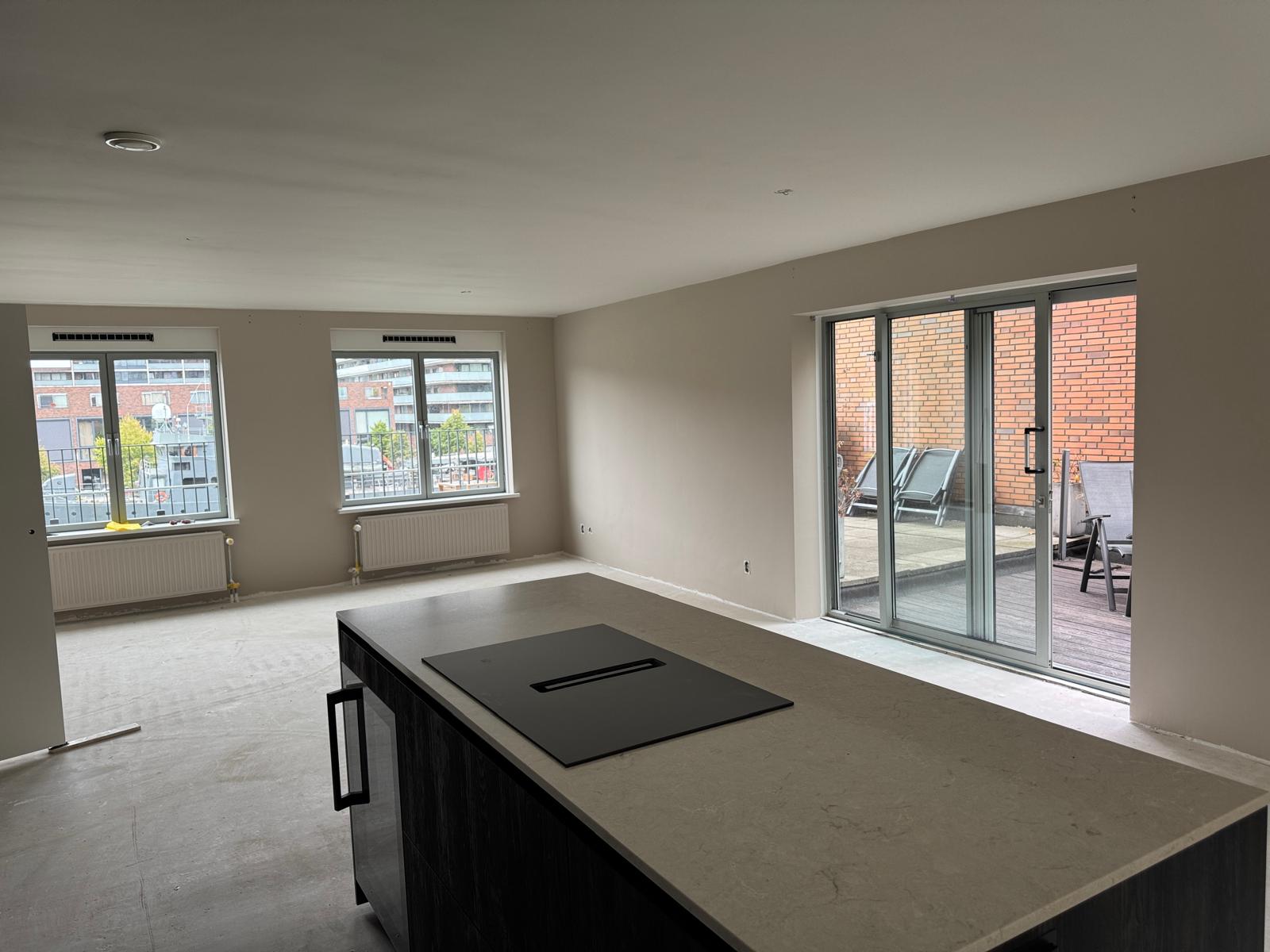 Glad stucwerk in woonkamer