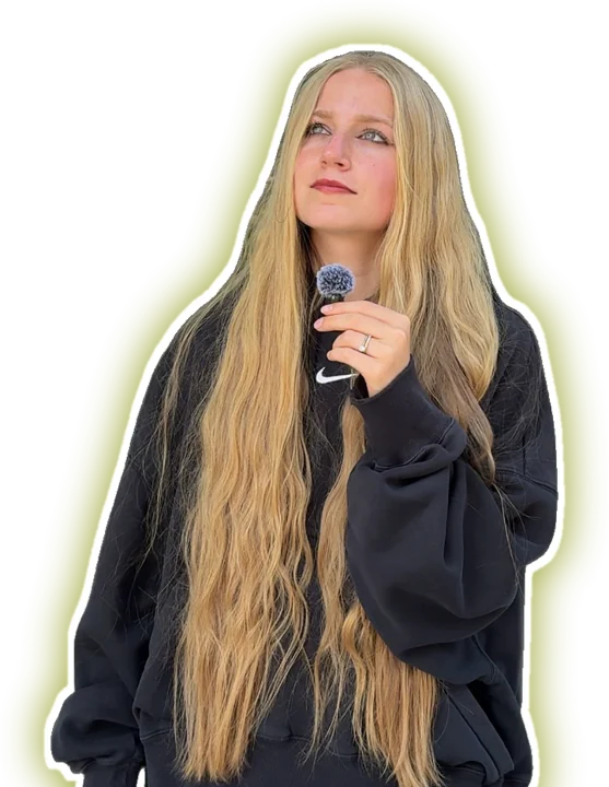 Ava holding a microphone