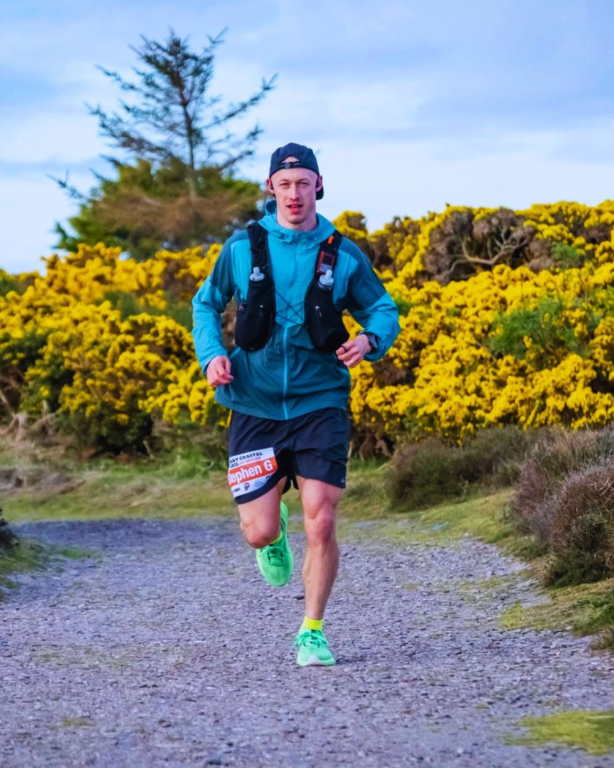Stephen running a coastal trail race