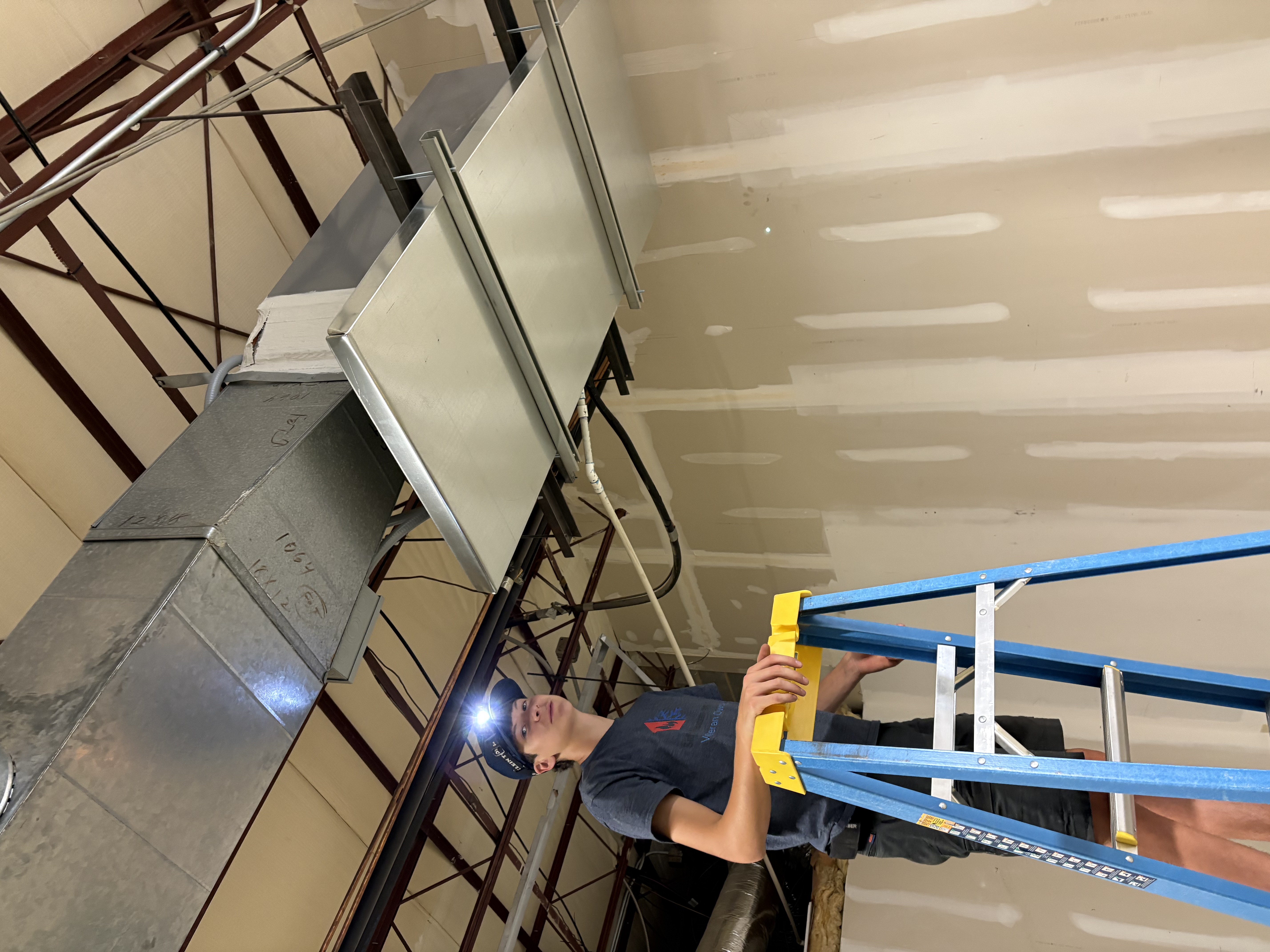 Gene from Sid's Heating and Air servicing a furnace in Union County