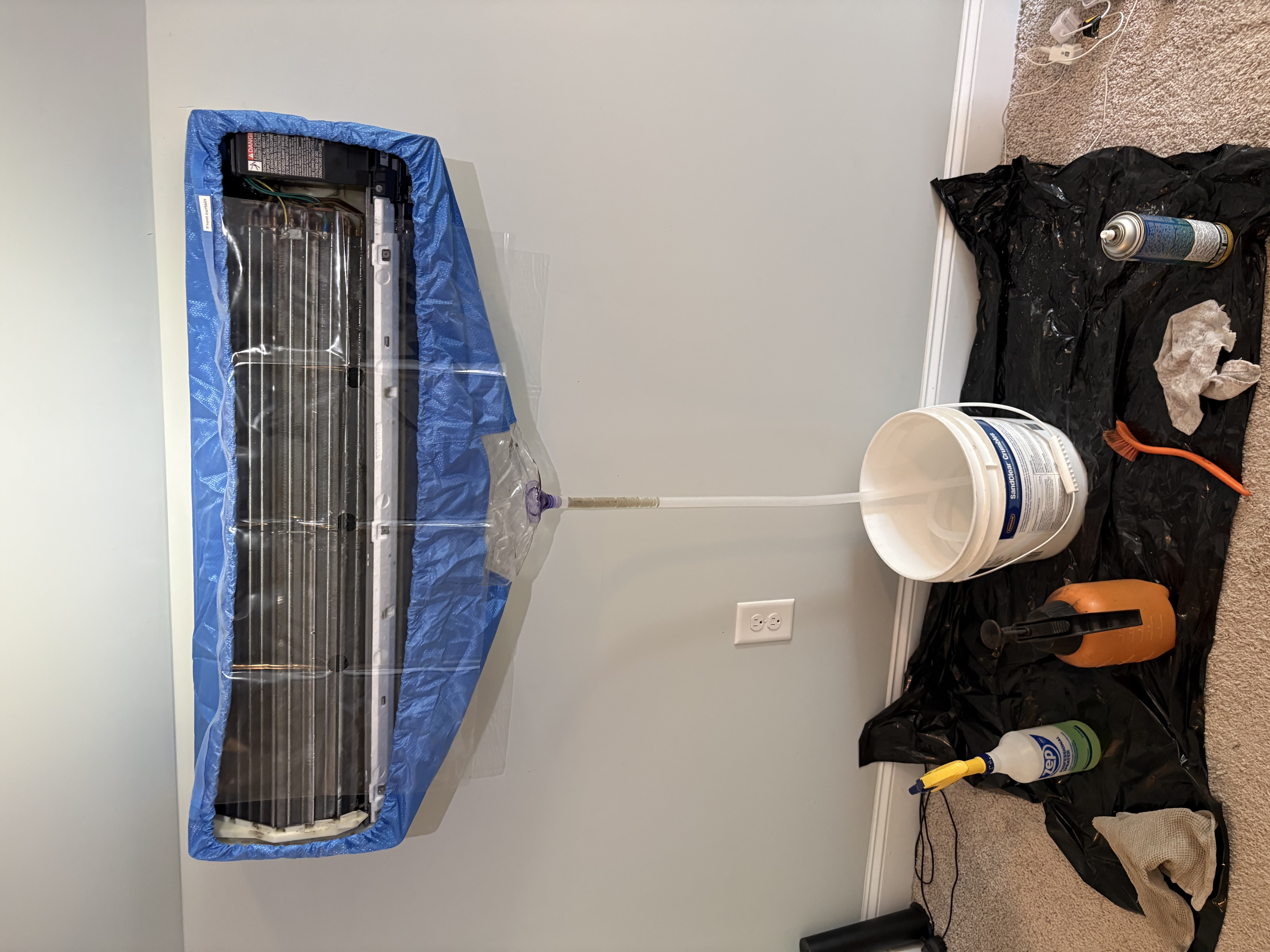 Sid's Heating and Air technician servicing a heating system in Monroe NC