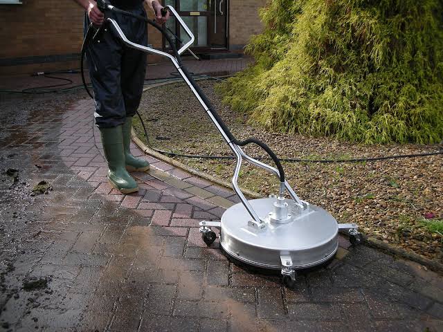 Freshly cleaned and sealed patio surface with water beading in Lorain County, Ohio