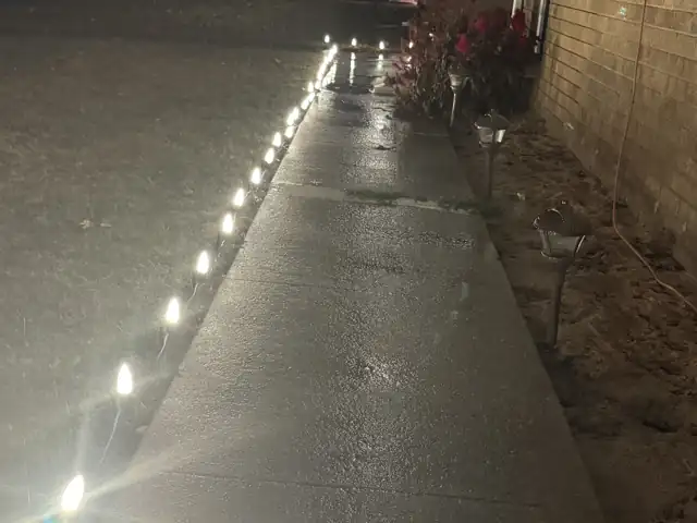 Pathway stake lights along a front walk