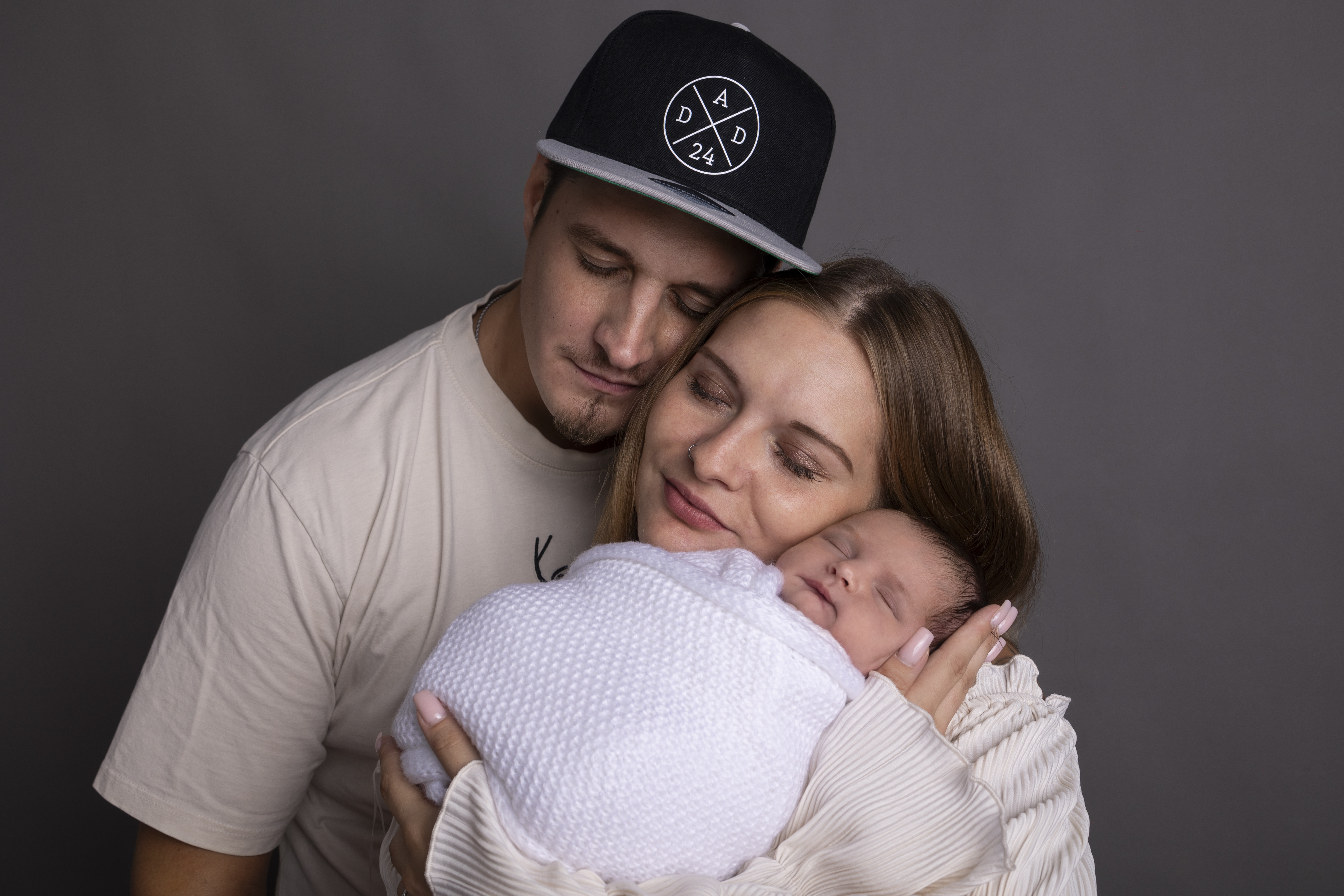 Newborn-Baby mit Eltern