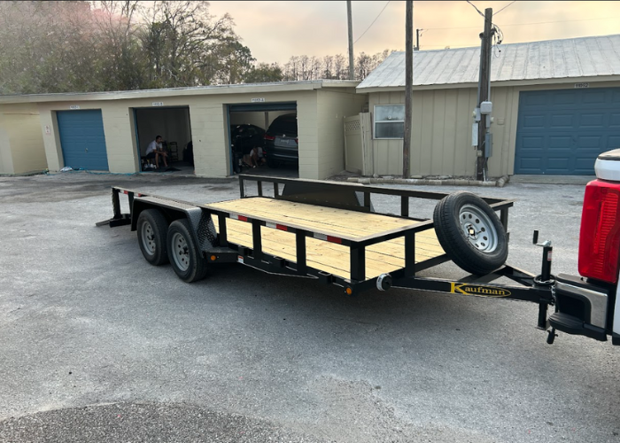 16 ft open utility trailer with steel frame, perfect for hauling landscaping equipment and supplies