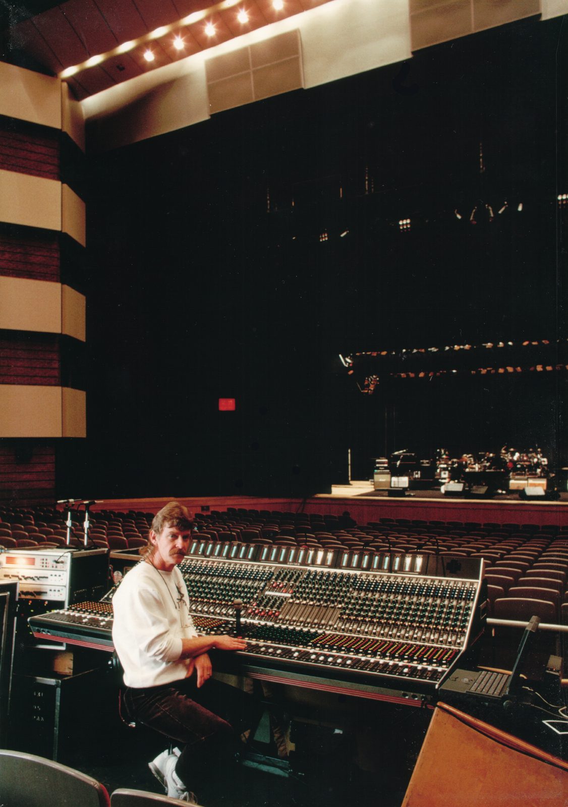 Alone at the console in an empty hall
