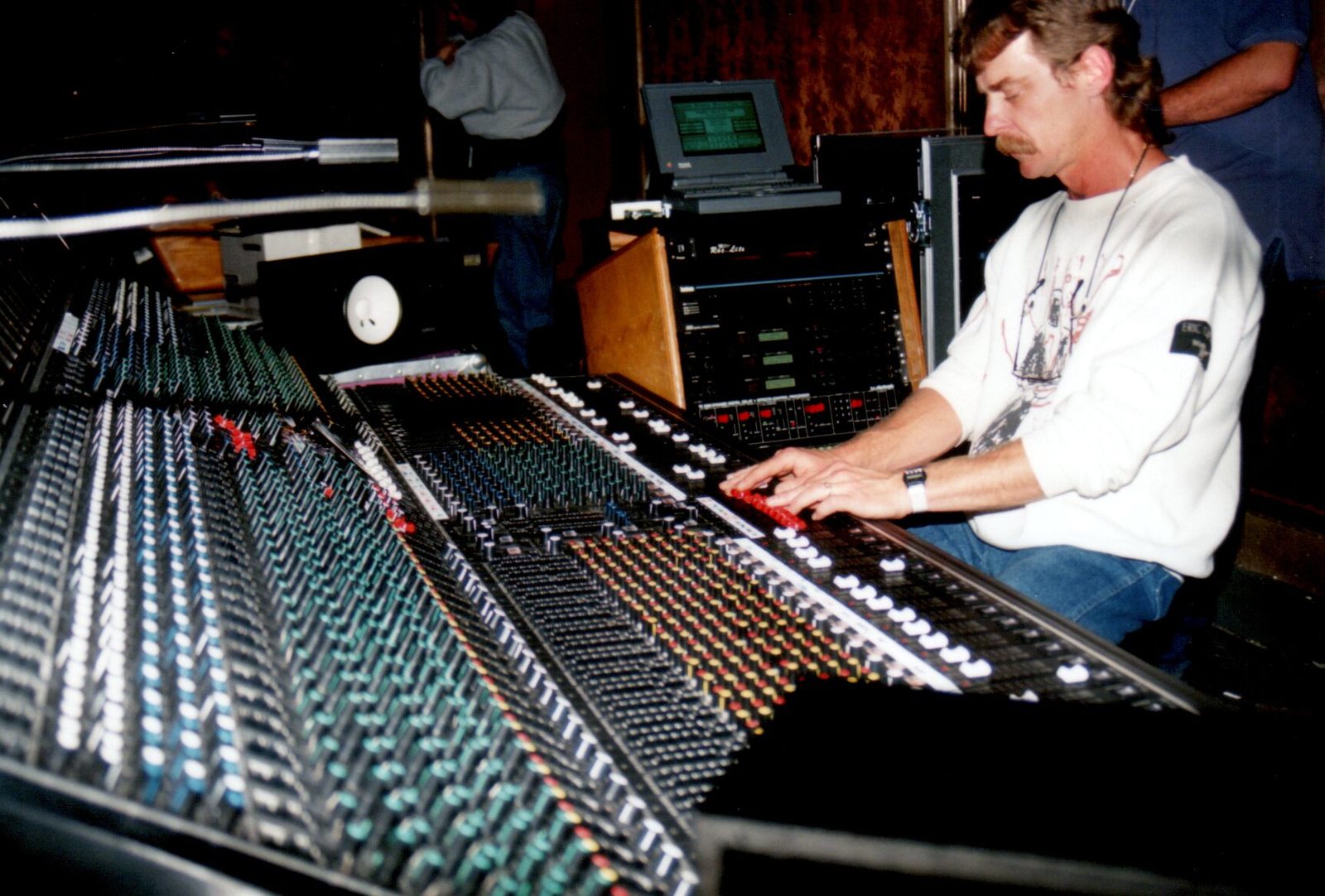 Buford Jones with both hands on the faders