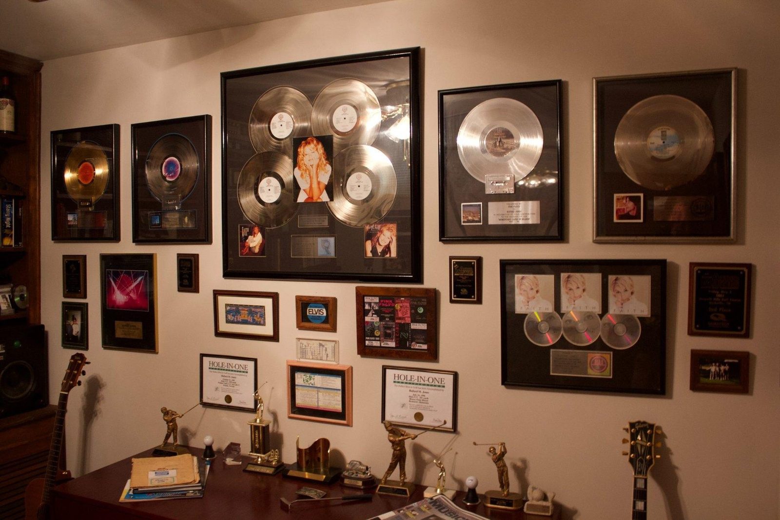 A wall of platinum records and awards from Buford Jones's career