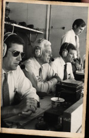 Charlie Mac and the broadcast crew in the press box