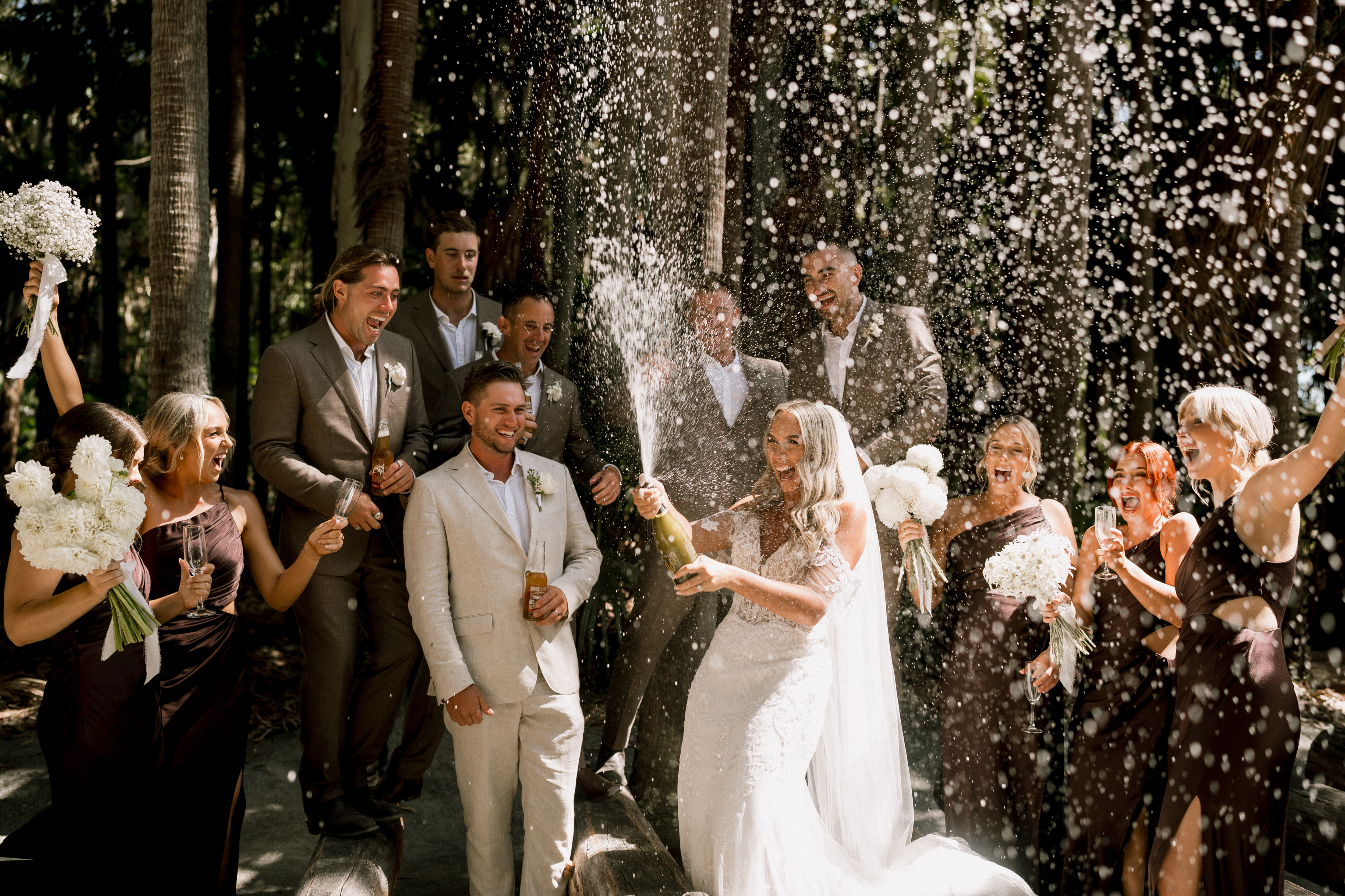 A kiss inside a tunnel of sparklers on the dance floor