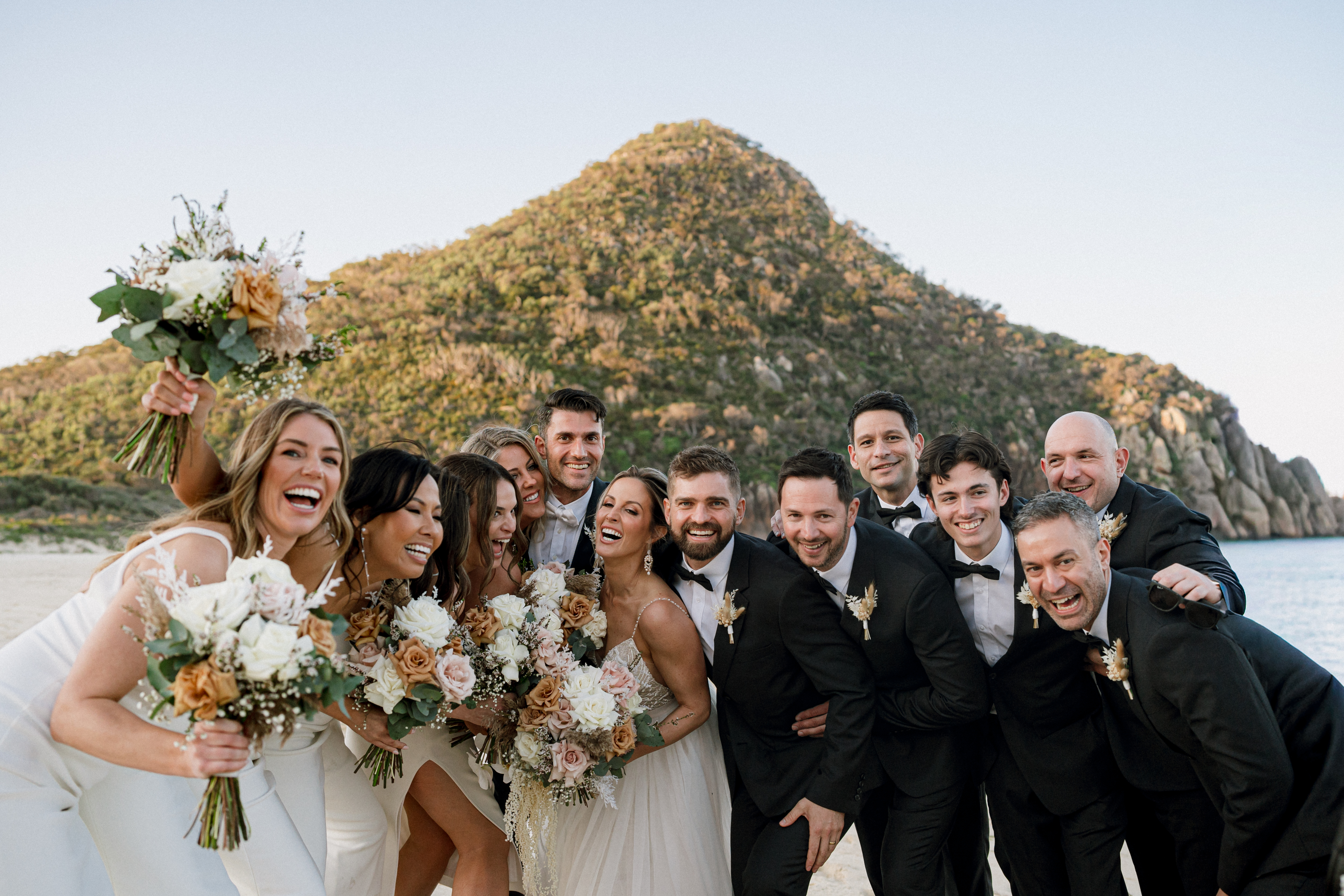 Bridal party in front of Tomaree Head at Port Stephens