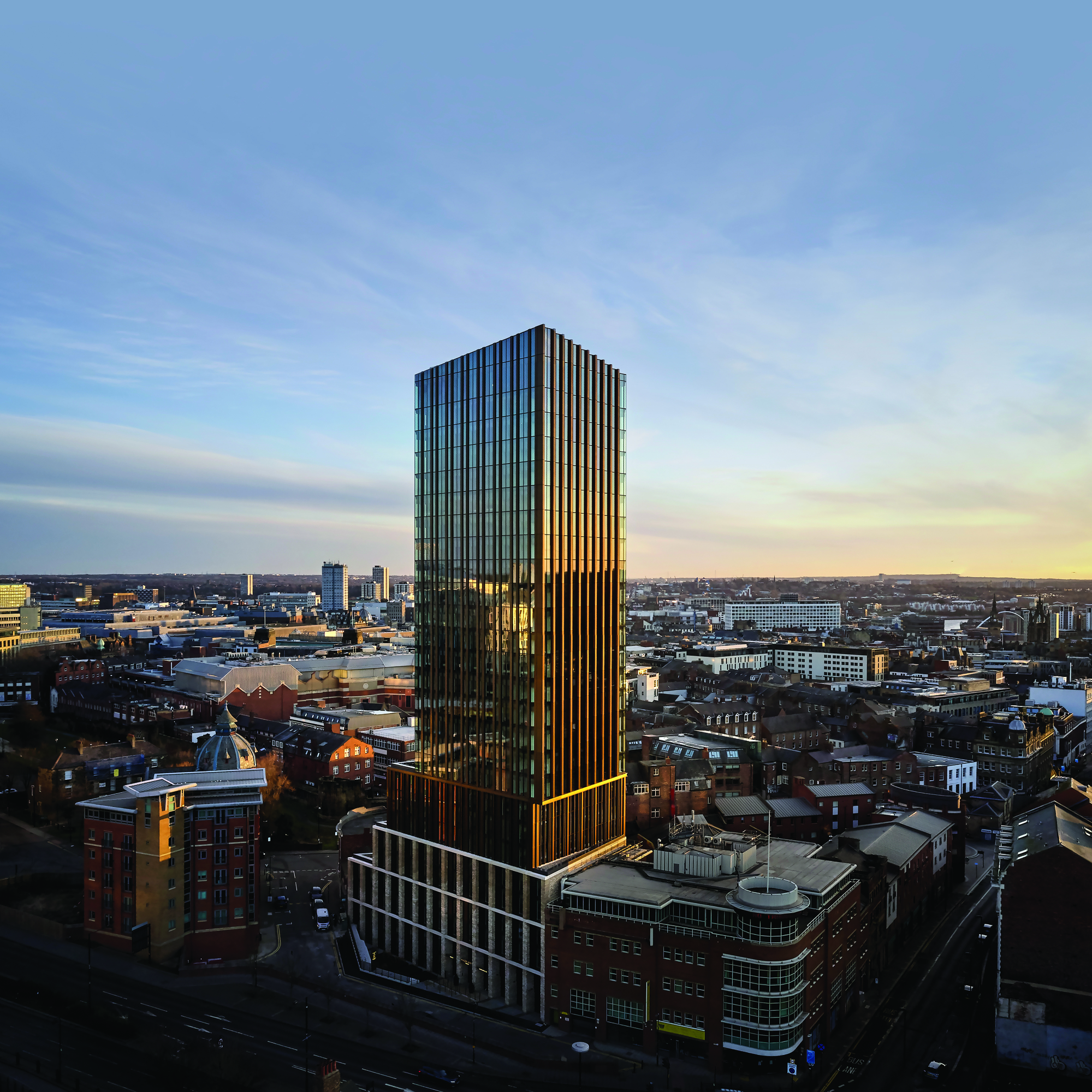 The 3Sixty sky lounge at golden hour, with the Newcastle skyline beyond the floor-to-ceiling glass