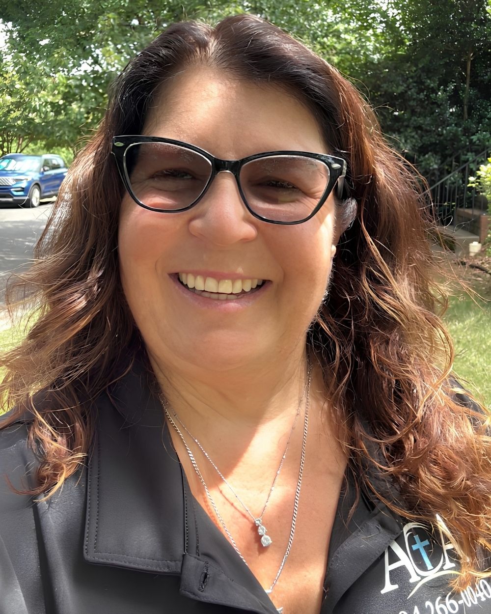 Karen, Owner and Client Care at A Cut Above Landscaping