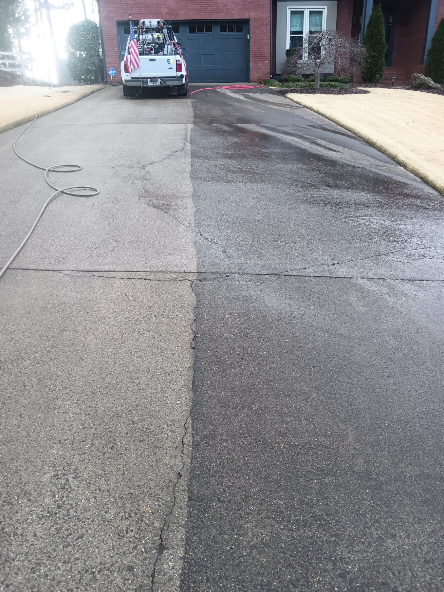 Before and after long driveway cleaning in Canton GA by Mechanical Magic