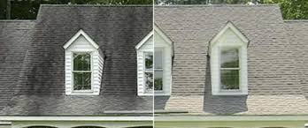 Dark grey roof before and after soft wash cleaning showing uniform dark shingle color restored from blotchy algae staining