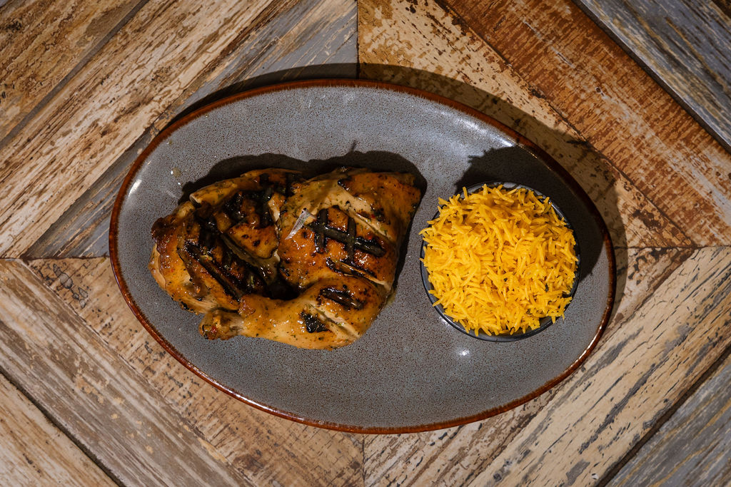 Flame-grilled peri peri half chicken