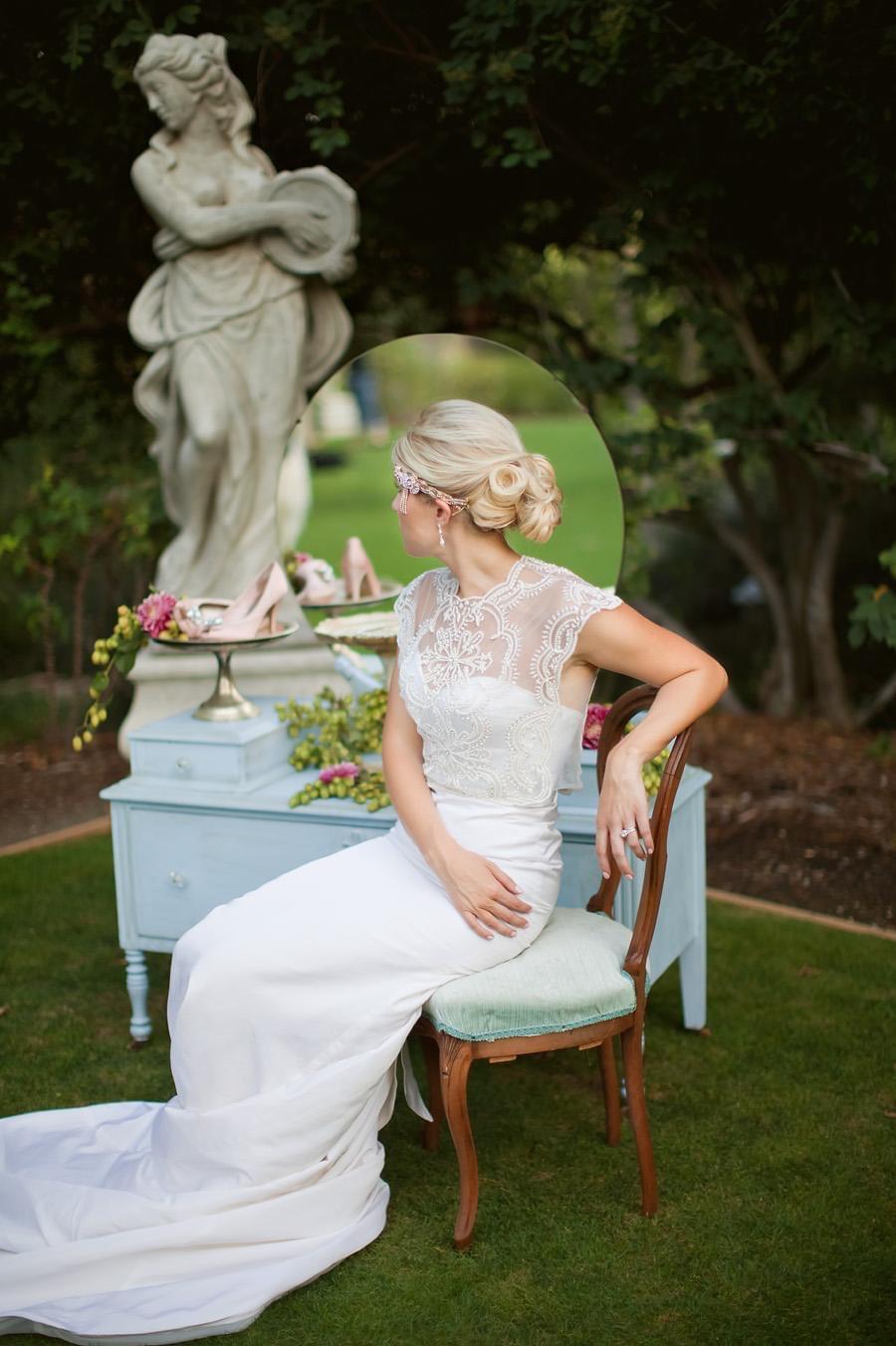 Elegant bridal updo with soft waves by mobile wedding hair stylist Tampa Bay