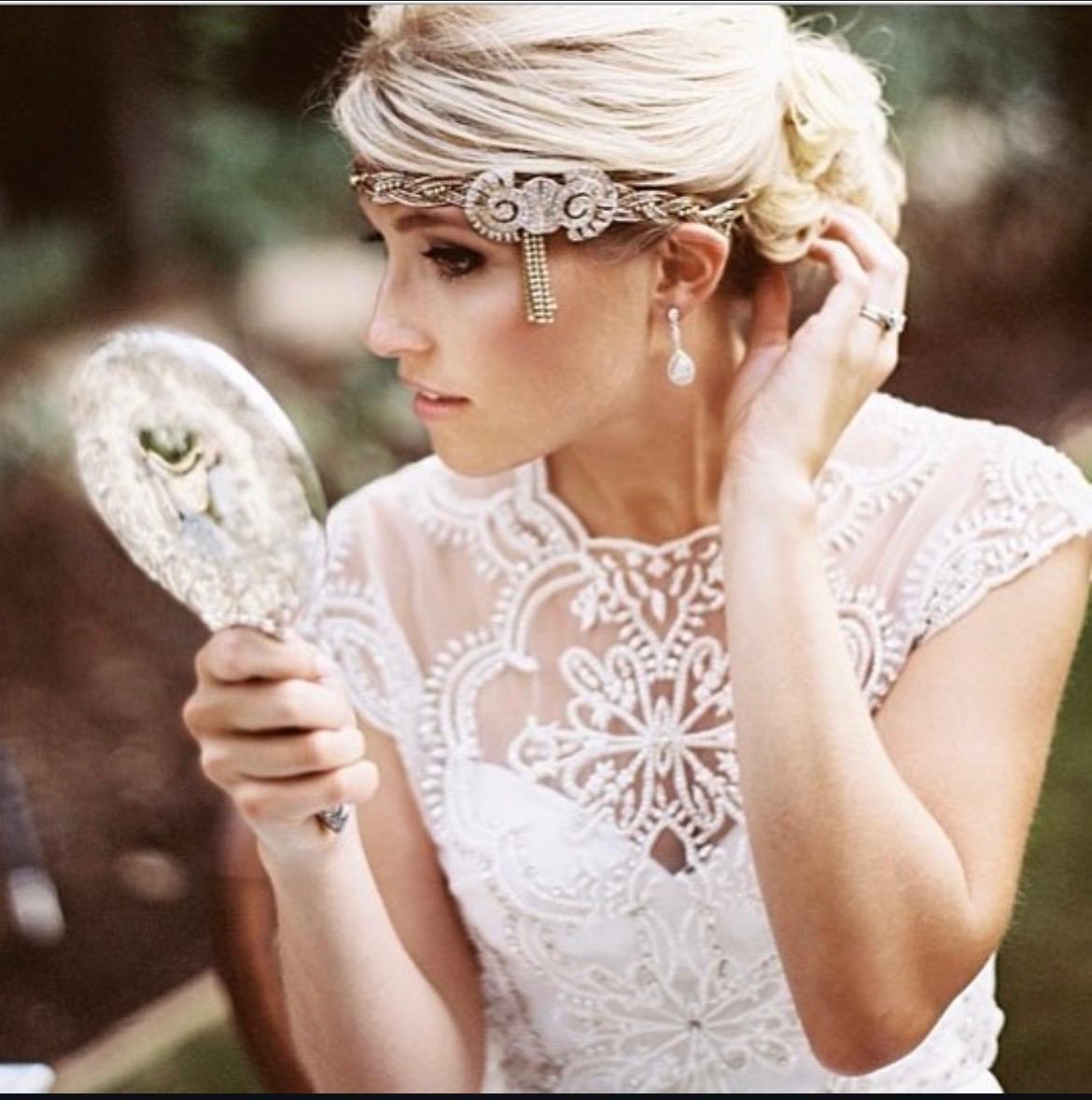 Beautiful bridal hair styling with classic updo for St. Petersburg wedding