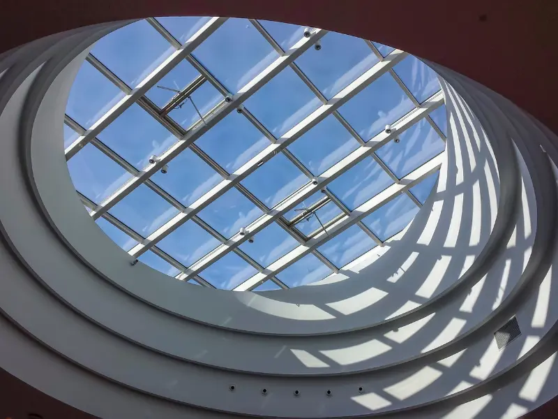 Large architectural atrium skylight, shown for illustrative comparison only.