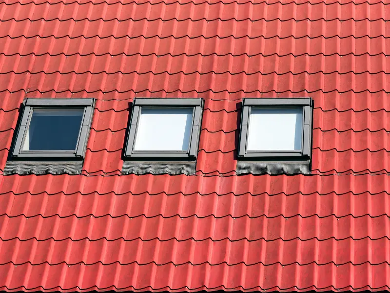 Clay tile roofing material considered for skylight installation in Yucaipa, CA.