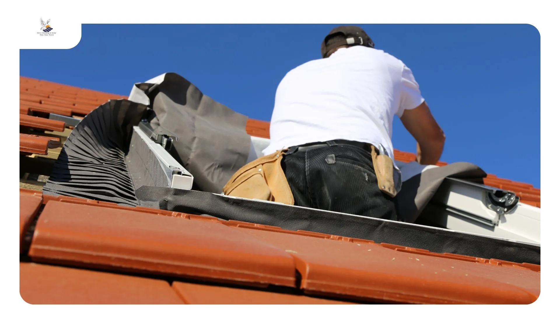 Roofer inspecting corroded flashing around a skylight curb on a tile roof — leaking skylight repair Rancho Mirage