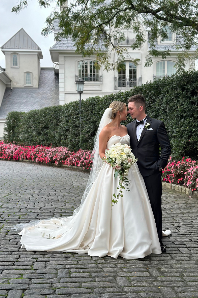 Outdoor ceremony with the officiant between the couple