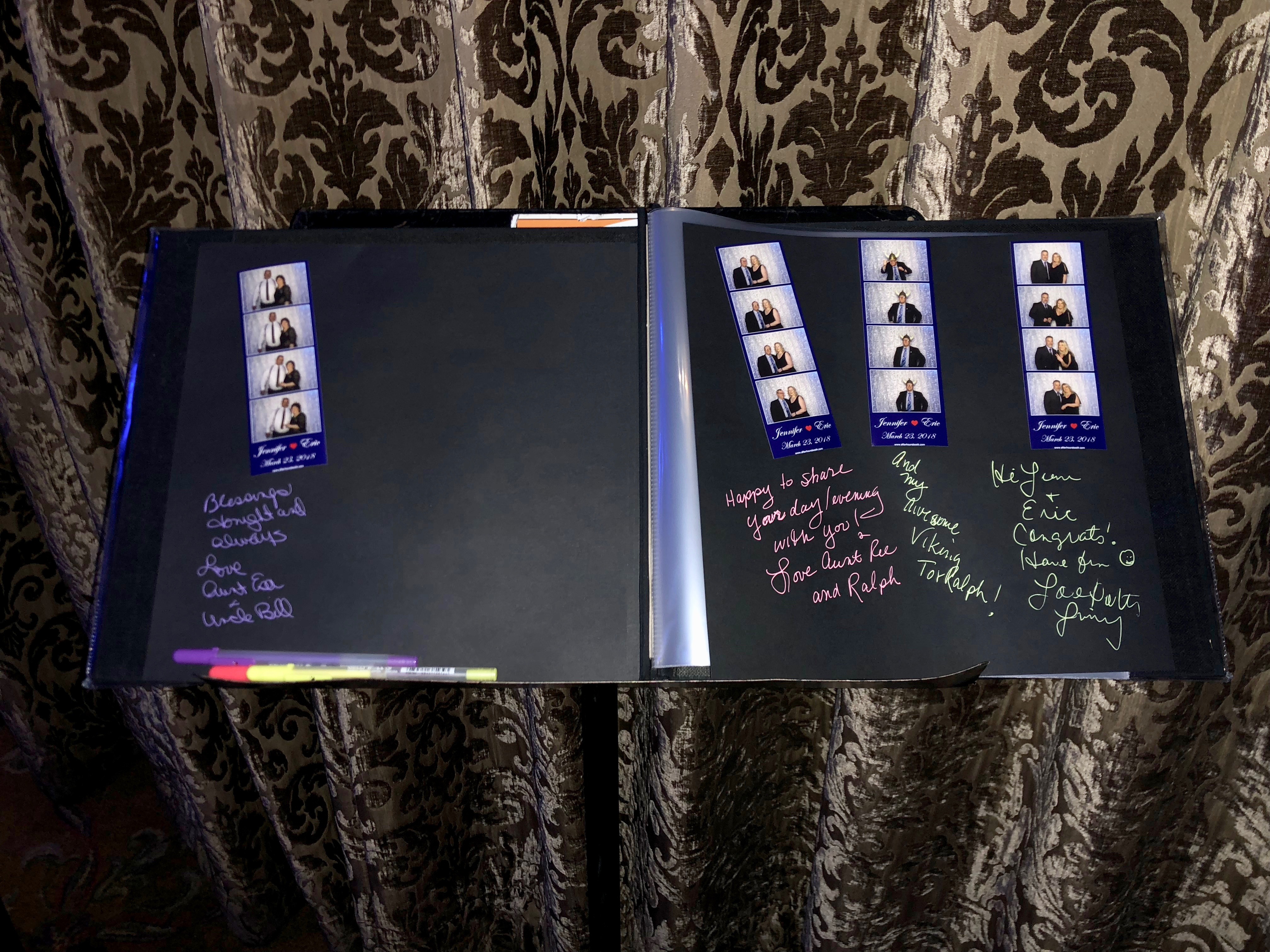 Finished photo booth scrapbook with print strips and guest messages