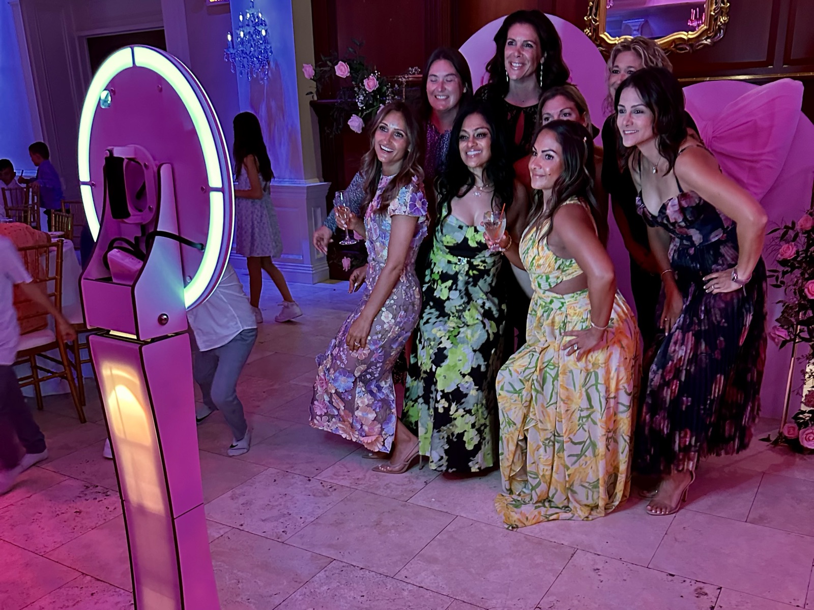 Guests at a ring light photo booth