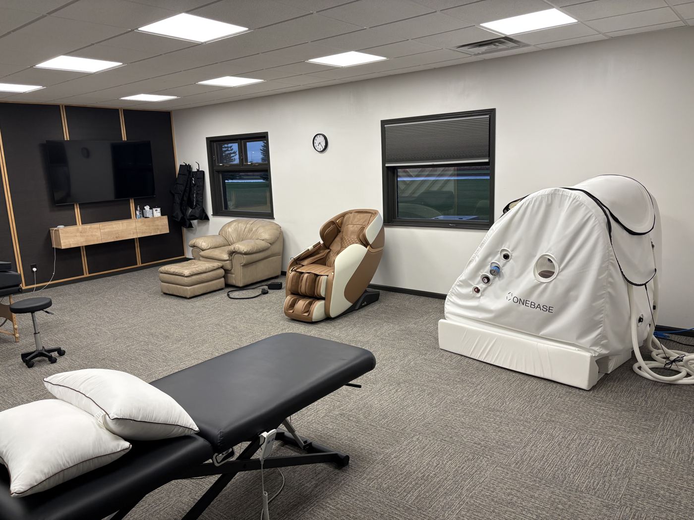 The Morgain Longevity Lounge with recovery chairs and treatment tables