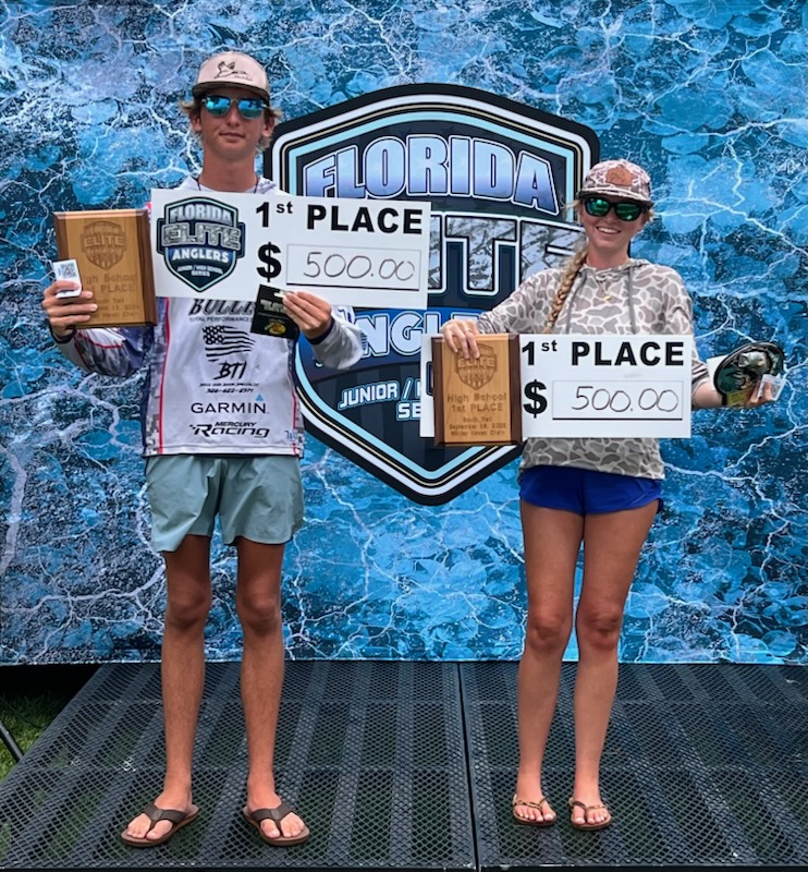 Ella Ready and Landon Haynes with the $500 checks, plaque and Big Bass trophy.