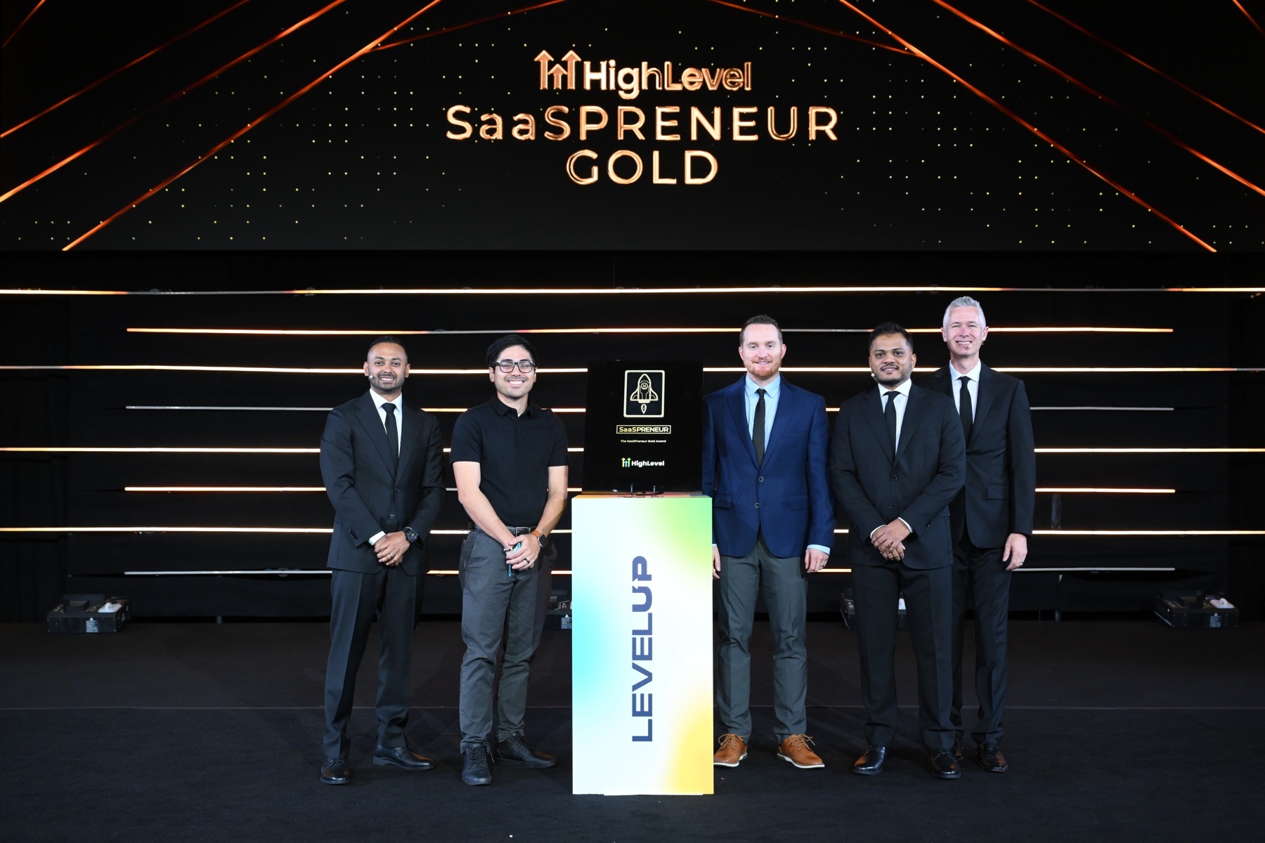 NextLevel team accepting the HighLevel SaaSPreneur Gold Award
