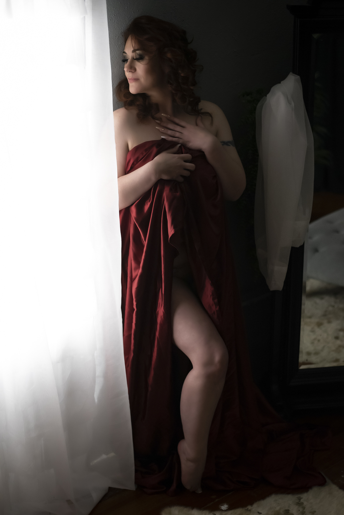 red haired woman draped in sheets Boudoir