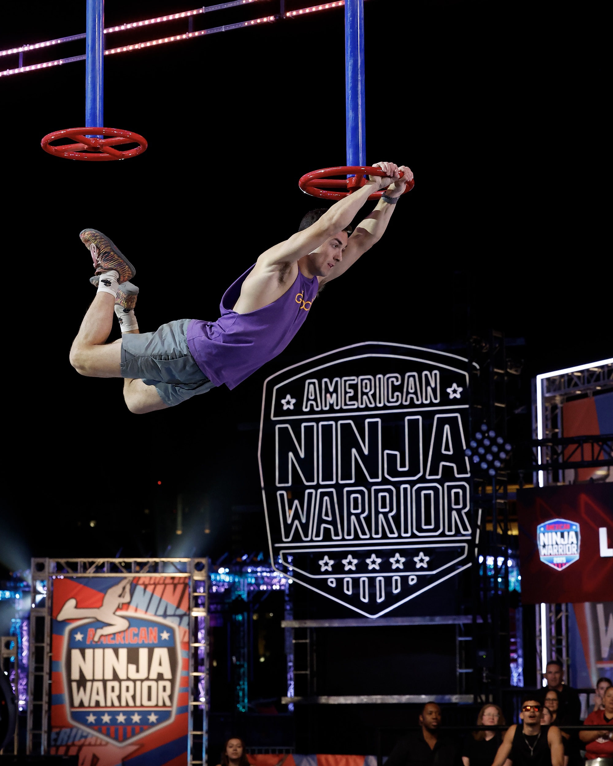 Jonathan swinging between ring obstacles