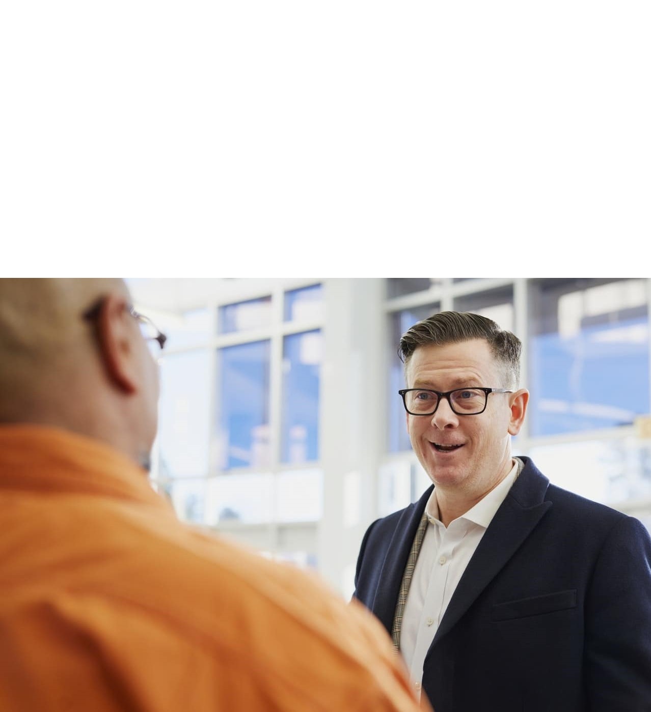 An Alliance advisor meeting with a client