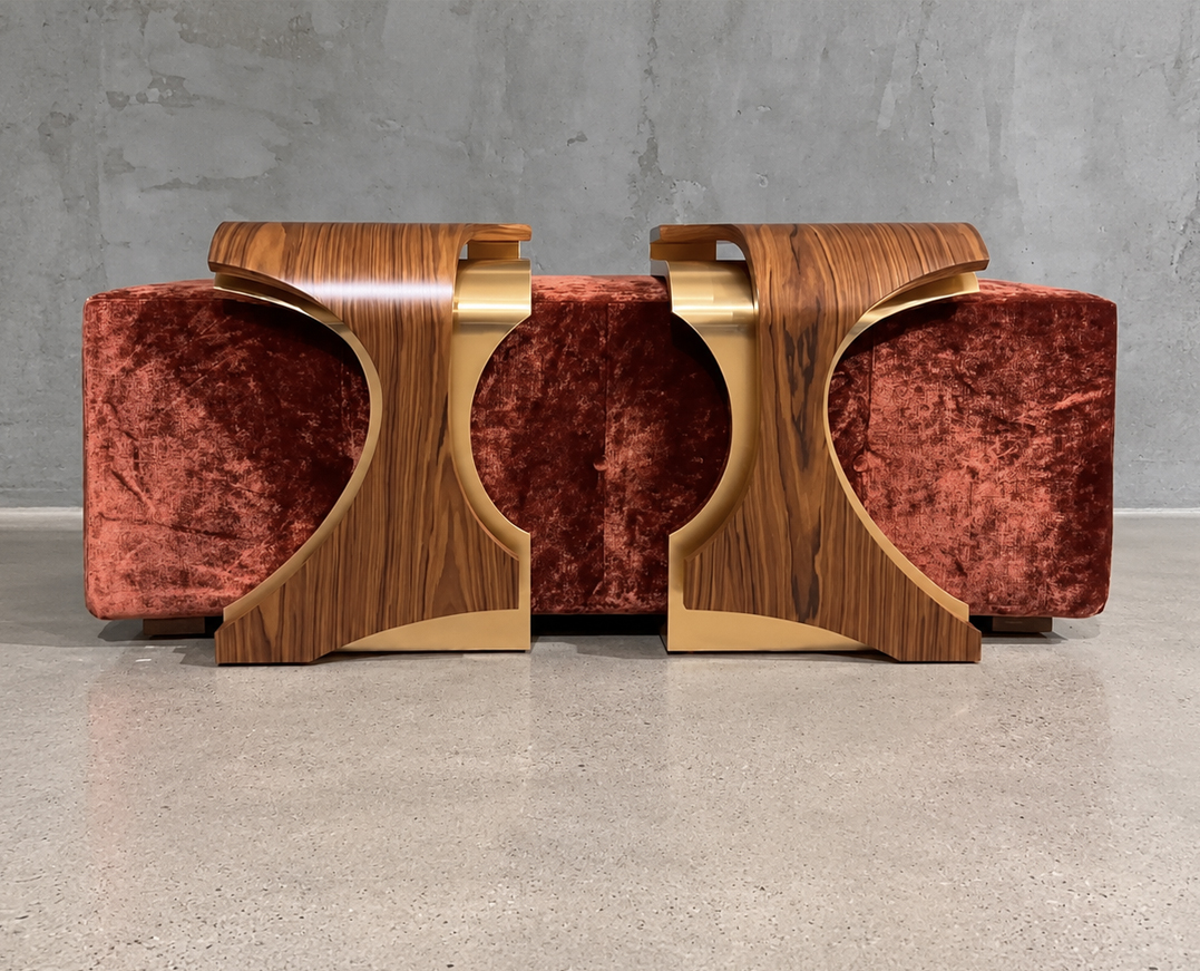 Sculptural rosewood furniture with red velvet seating