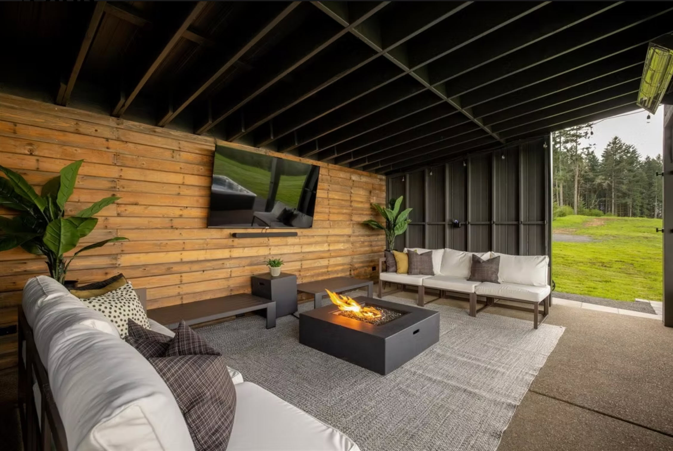 Covered outdoor lounge with fire table