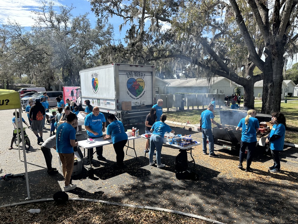 Hands-on teamwork sorting and preparing fresh food for families