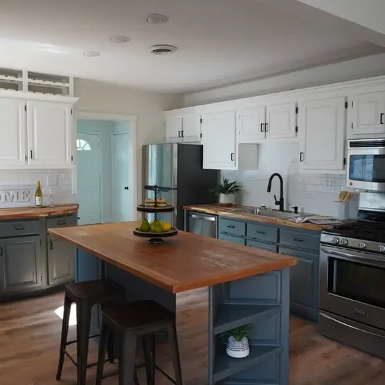 St. Louis kitchen renovation experts installing energy-efficient LED under-cabinet lighting
