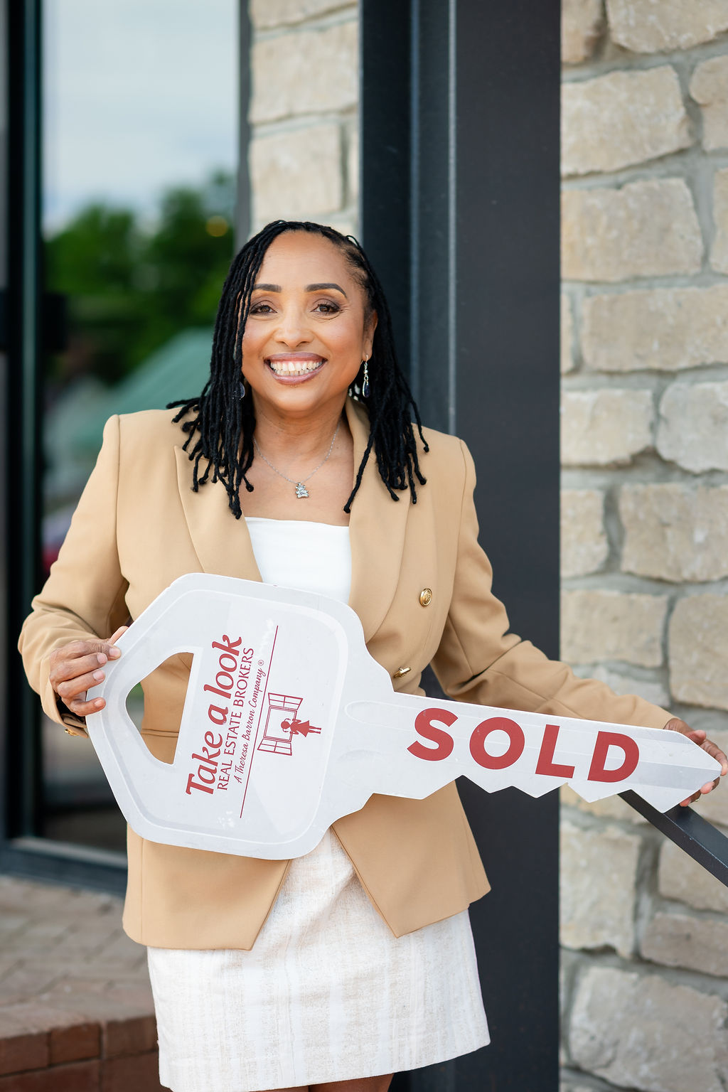 Portrait of Theresa Barron, Owner and Managing Broker of Take A Look Real Estate Brokers