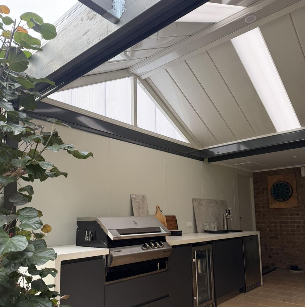 Outdoor kitchen under a gable roof