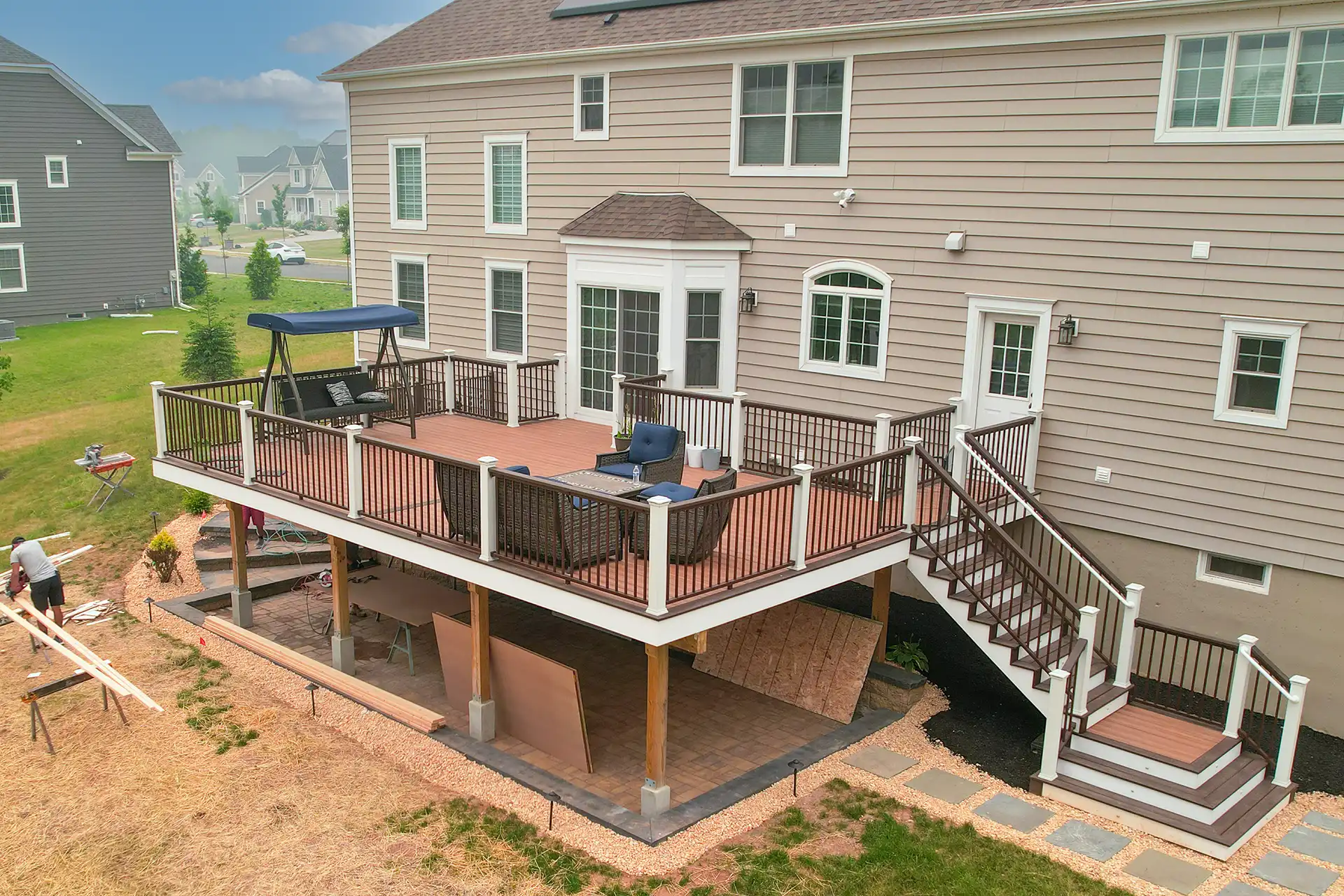 Composite deck build — boards, railing, and stair system