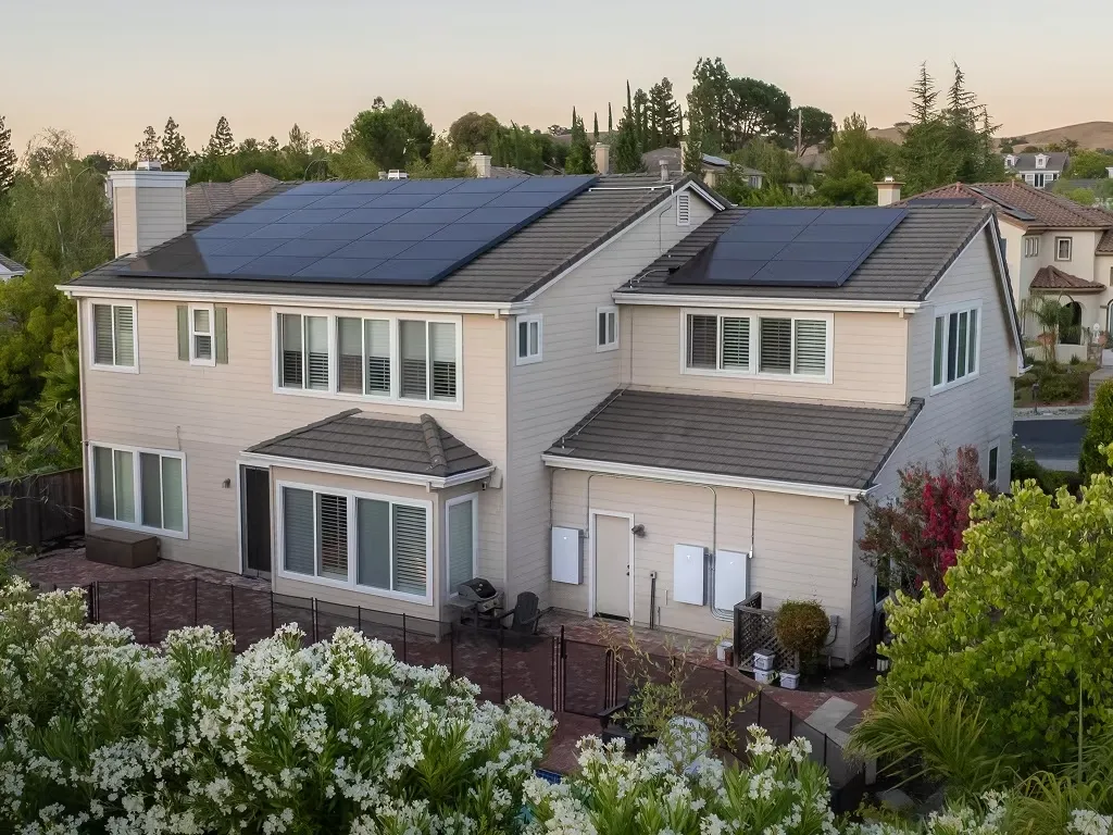 Two-story home with rooftop solar panels