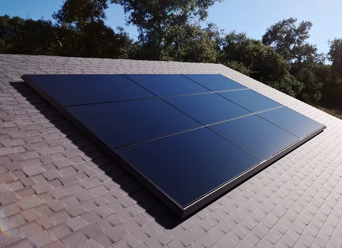 Low-profile solar panels on a shingle roof