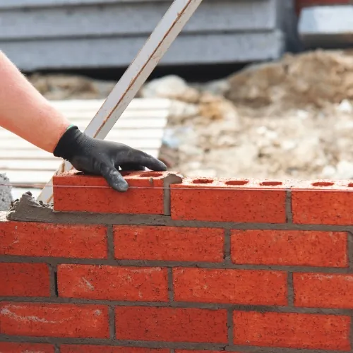 Stone masonry in Sugar Land, TX installed as a home exterior accent