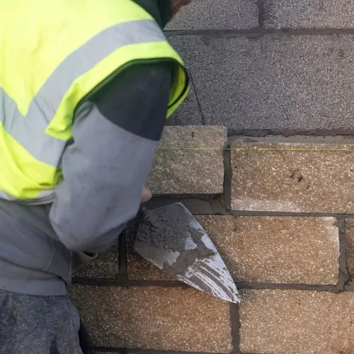 Brick masonry in Sugar Land, TX with clean mortar joints and level courses