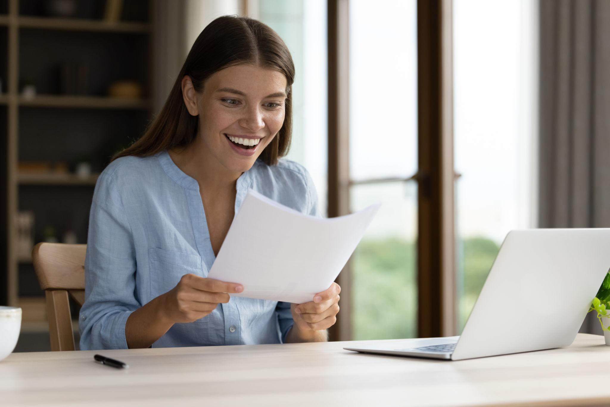 New college student reflecting after receiving acceptance letter