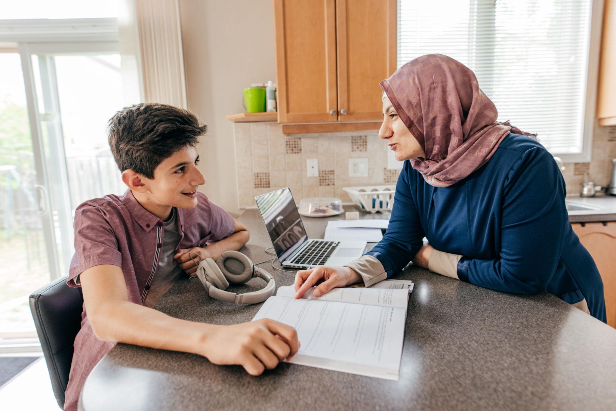 “Parent preparing child for college through conversation”